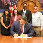 Mayor Harrell signs Transportation and Climate Justice Executive order.