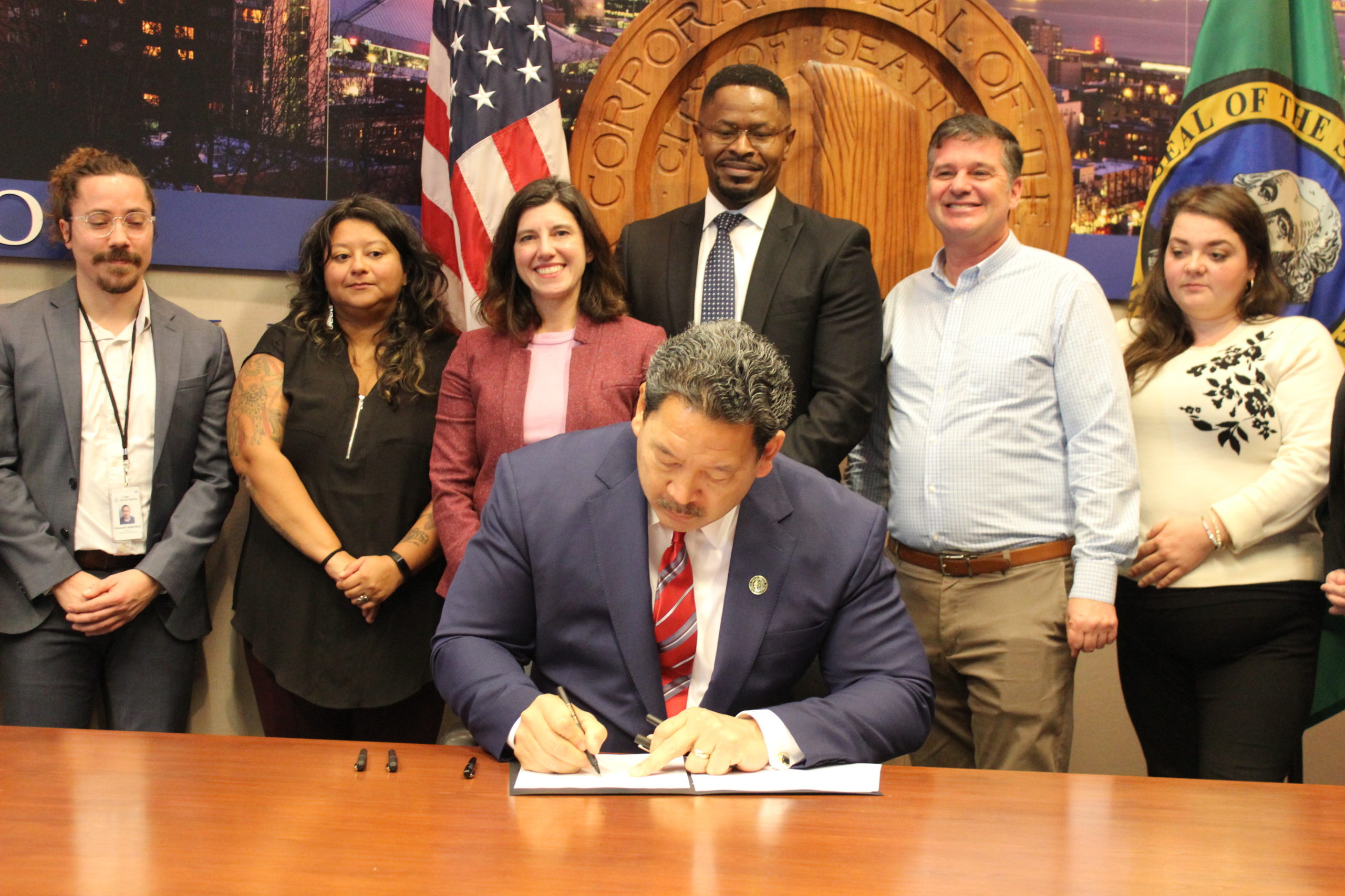 Mayor Harrell signs Transportation and Climate Justice Executive order.
