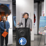 Mayor Harrell speaks at Arte Noir gallery.