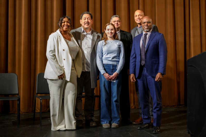 Mayor Harrell, Dr. Brent Jones, and other leaders at Nathan Hale High School