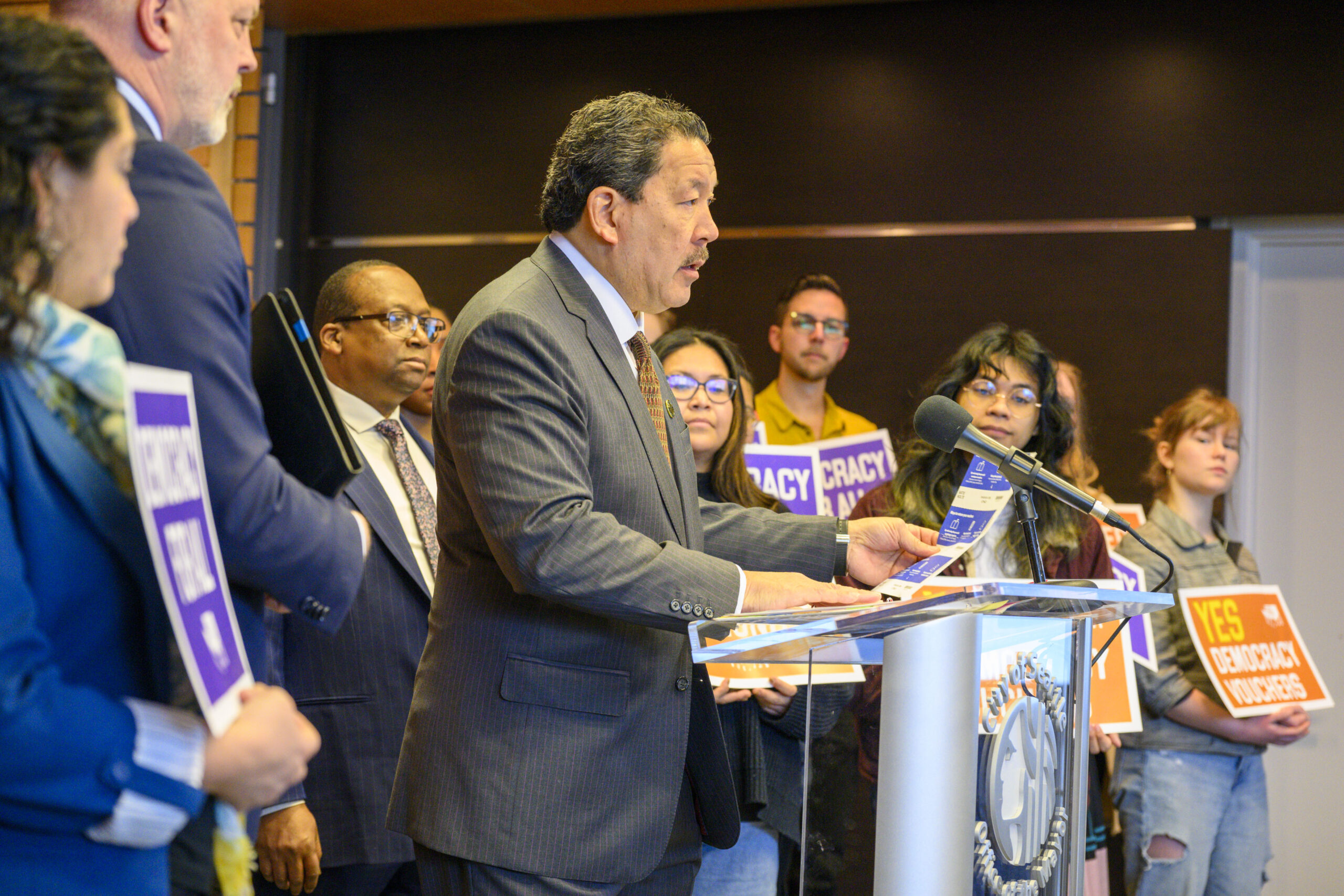 Mayor Harrell speaks at a press conference announcing his proposal to renew the Democracy Voucher Program